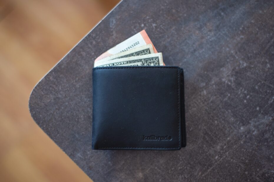 leather black wallet on table feat
